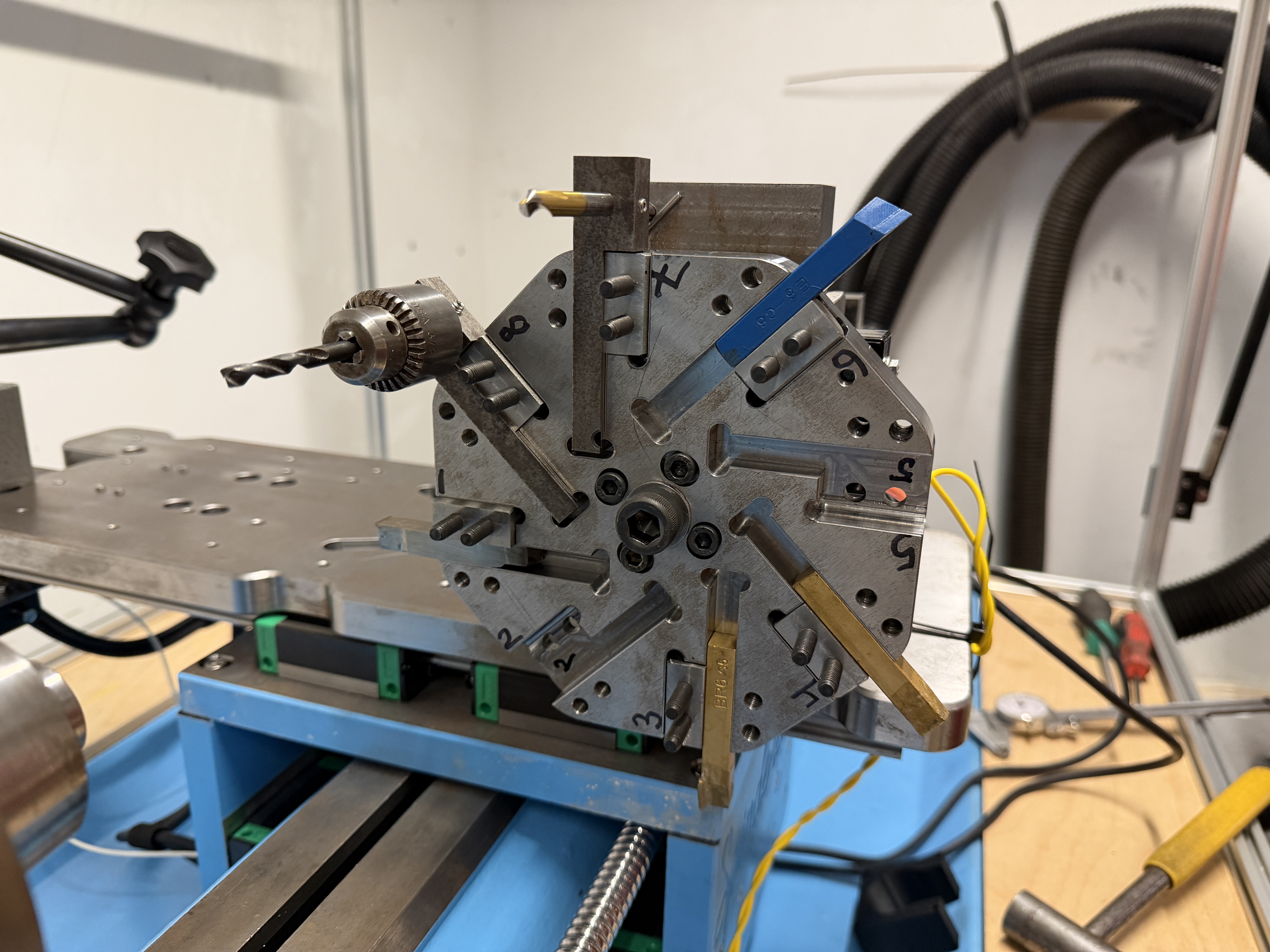 8-station turret tool changer loaded with tools